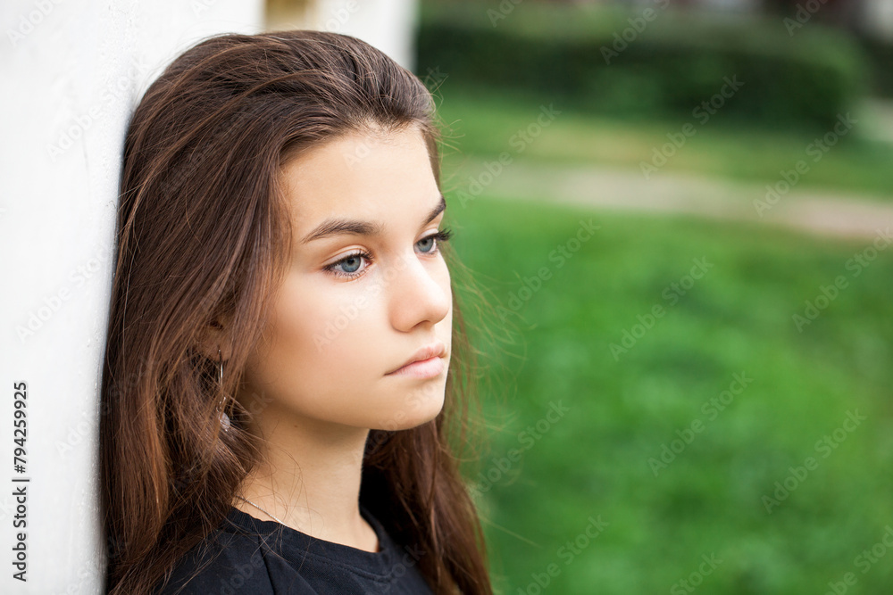 Young beautiful brunette girl, autumn park outdoors Young beautiful brunette girl, autumn park outdoors
