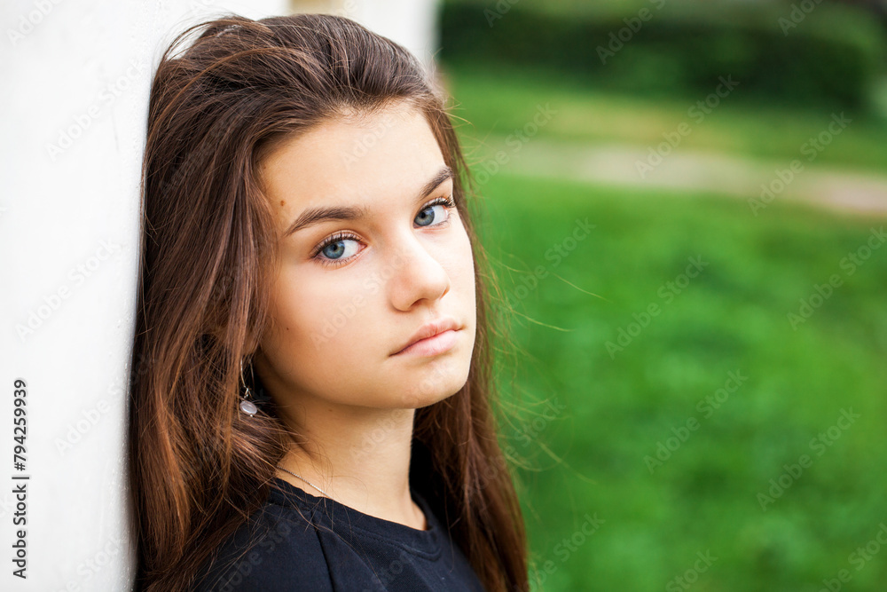 Young beautiful brunette girl, autumn park outdoors Young beautiful brunette girl, autumn park outdoors