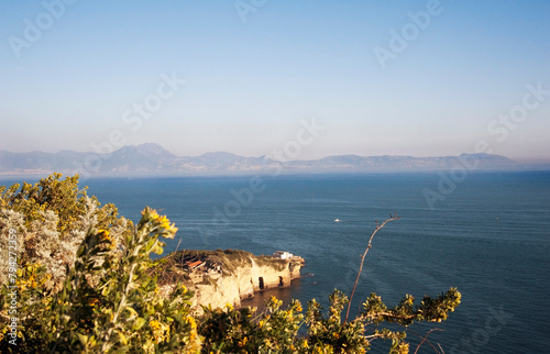 Gulf of Naples with the bay Trentaremi below seen from the Virgil Park at sunset. Italy. photo
