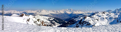 panoramic view of the southern slope of the Mont Blanc massif (4810 m), the highest peak in Europe and the Beaufortain valley, from the famous ski resort of La Plagne in the heart of the French Alps photo