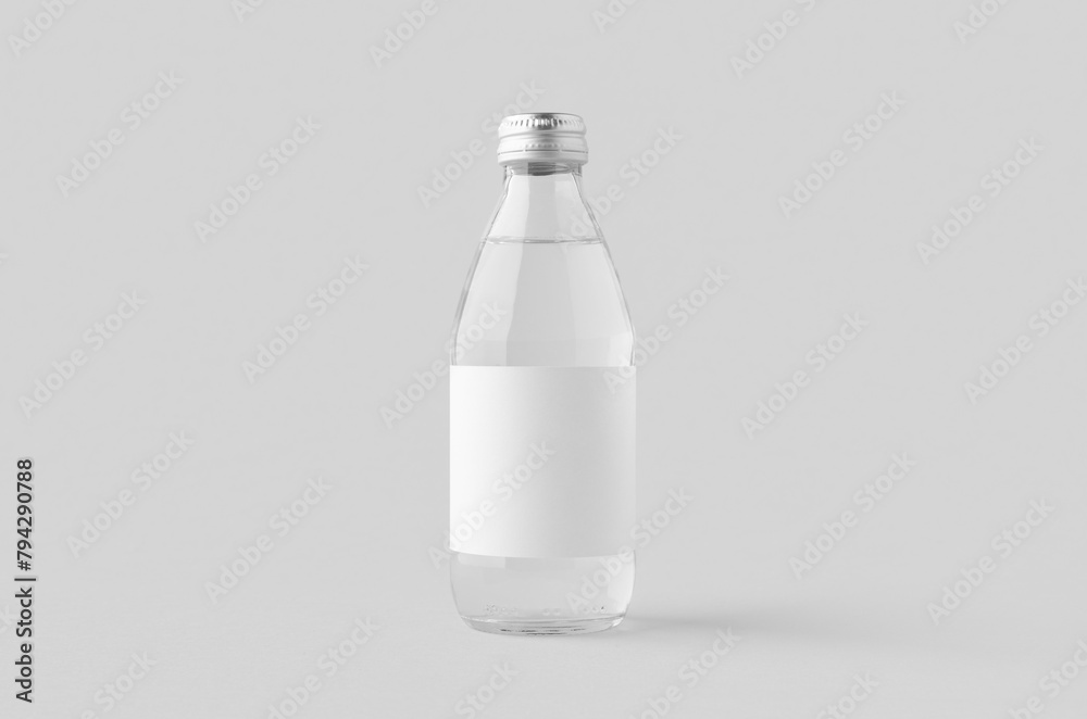 Small water bottle mockup with blank label. Clear glass.
