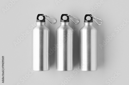 Reusable aluminum water bottle mockup. © Shablon