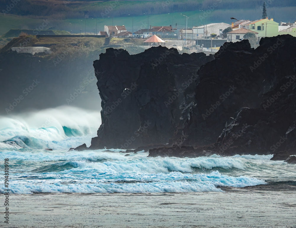 Fototapeta premium Waves attacking the rocky cliff at the Santa barbara beach on San Miguel island, Azores. 