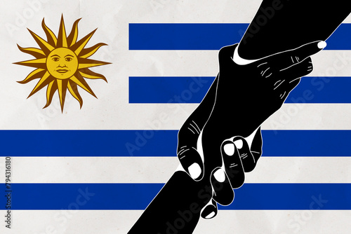 Helping hand against the Uruguay flag. The concept of support. Two hands taking each other. A helping hand for those injured in the fighting, lend a hand