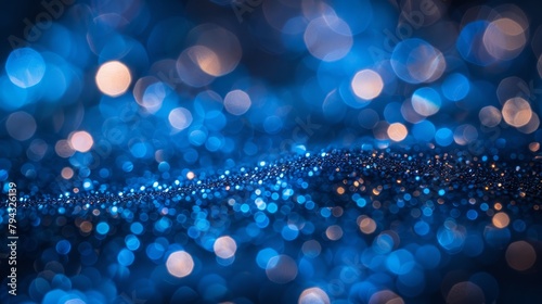  A crystal-clear image featuring a blue backdrop with tiny circles of blue and golden glitter along its edges