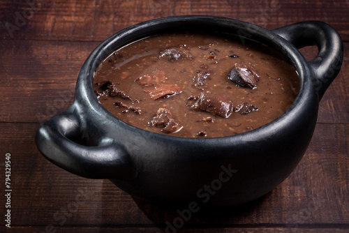 Feijoada, typical Brazilian food made with black beans. © WS Studio