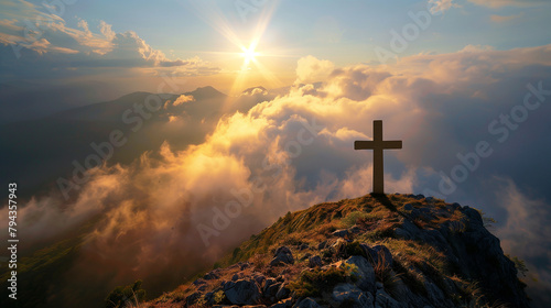 From a distant viewpoint, the Catholic cross stands as a beacon of faith on a mountain ridge, its contours highlighted by a golden shaft of sunlight piercing through a gap in the c