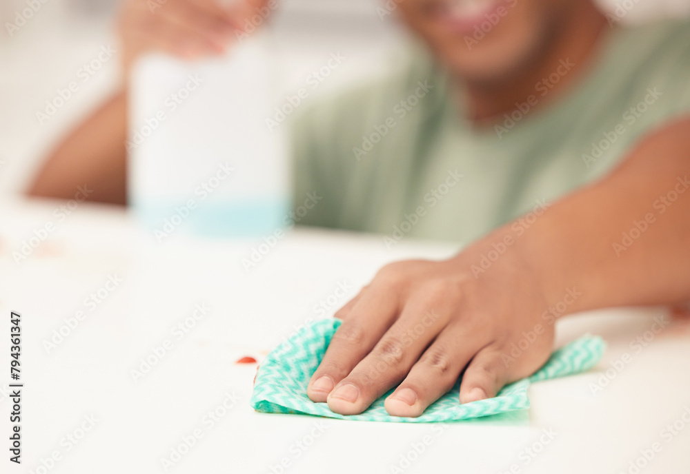 Hands, person or cloth for cleaning surface of furniture in home for domestic or housework chores. Closeup, wipe or cleaner with spray bottle for clean hygiene, sanitary, dust or chemical solution Hands, person or cloth for cleaning surface of furniture in home for domestic or housework chores. Closeup, wipe or cleaner with spray bottle for clean hygiene, sanitary, dust or chemical solution
