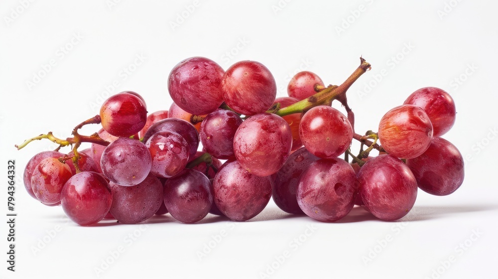 Red grapes against a white backdrop