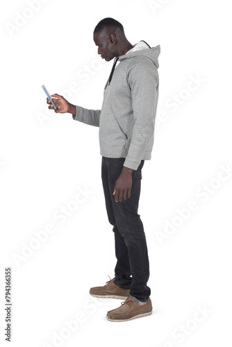 side view of a man holding a smartphone on white background
