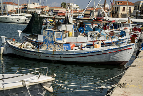 Greek boat on the background of the port on the island of Aegina