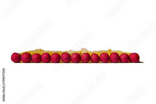 Isolated shot of matchsticks with red tip on a transparent background.  photo