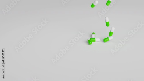 White and green pills falling on light background in slow motion. Drugs, pills, tablets, medicine concept. 3d render animation (ID: 794387531)