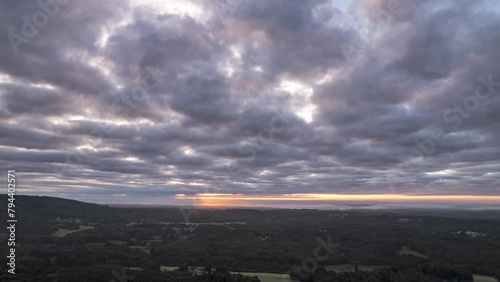 Timelapse Hyperlapse Aerial view of sunrise with lot of cloud and green trees