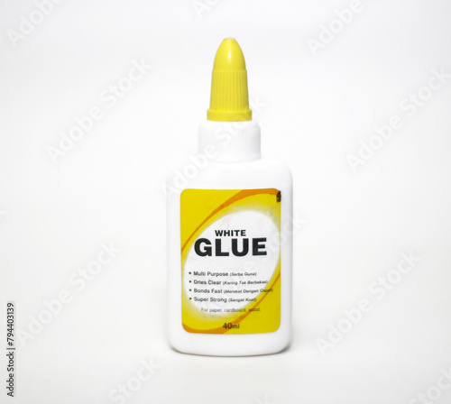 Bottle of white glue isolated on white background