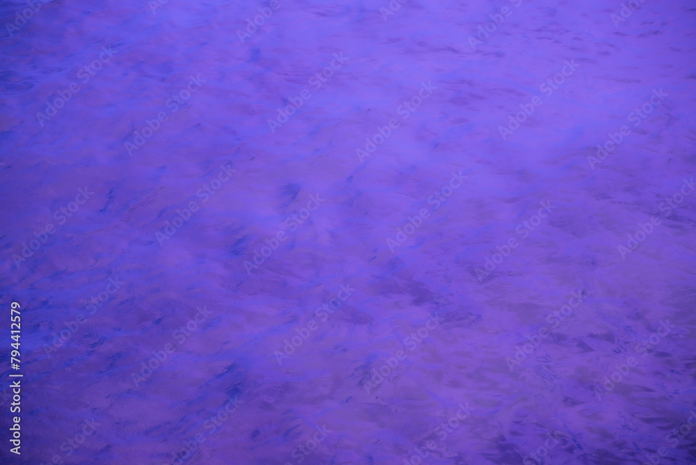 A purple background with a white line in the middle