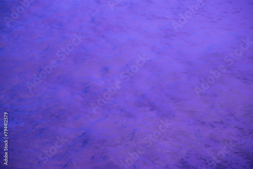 A purple background with a white line in the middle