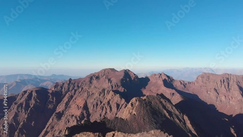 Aerial drone view in 4K of summit of Mount Toubkal in the Atlas Mountains, Morocco photo