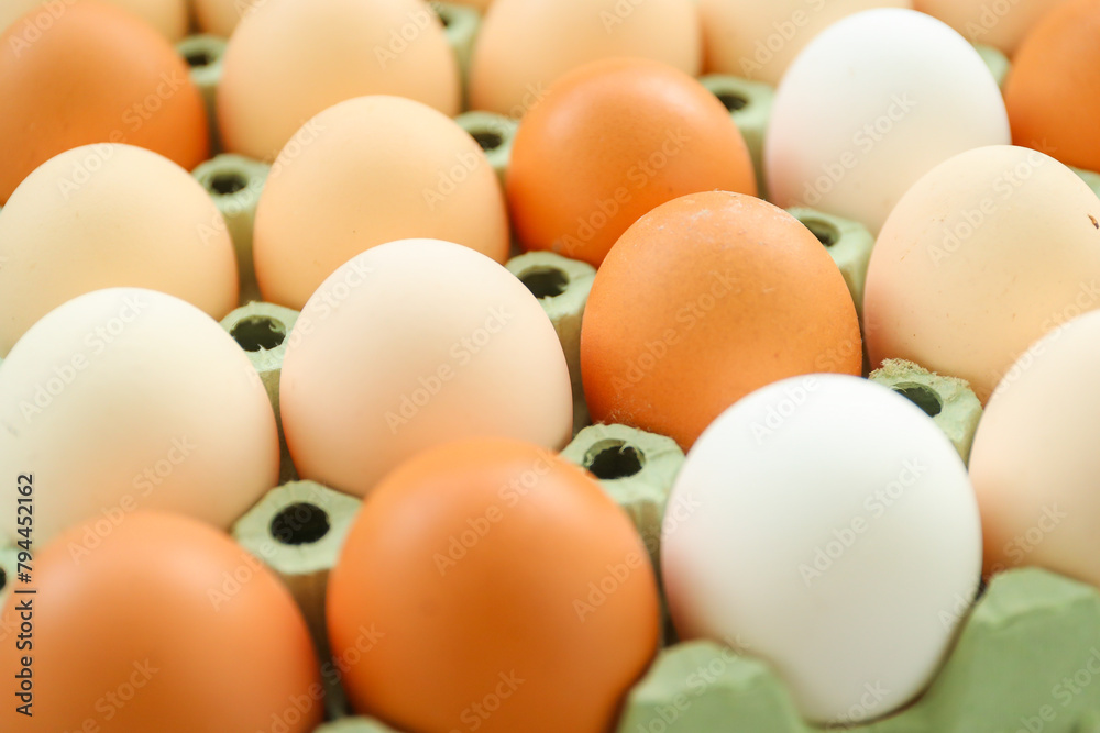 Chicken eggs in a cardboard box