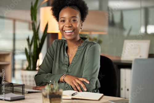 Arms crossed, portrait and smile with business black woman at desk in office for administration or research. Face, notebook and table with happy employee in workplace for start of professional career