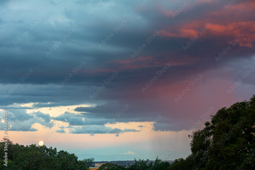 Fototapeta premium Idyllic and dramatic sky with multicolored clouds