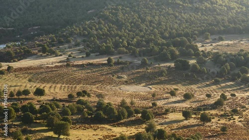 Green valley with restored grounds of Sad Hill Cemetery, the fictional round graveyard where the final duel of western The Good, The Bad and the Ugly takes place. View from above photo
