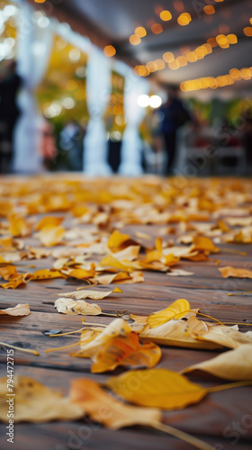 Autumn Leaves on Wooden Floor with Soft Bokeh of Party Lights