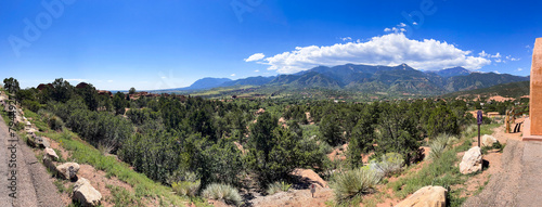 Panoramic view of the mountains including Pikes Peak in the Valley of the Gods Park in Colorado Springs, Colorado. photo