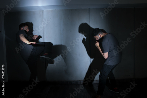 double exposure photograph of a person fighting against himself photo