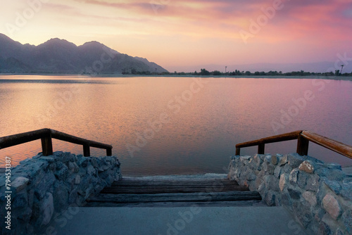 A beautiful sunset on the shore at lake Cahuilla, California. © GregLara