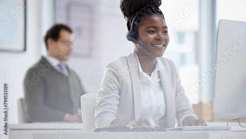 Employee, black woman and happy on computer at call center for customer or client support and service. Office, crm and advisor or consultant with smile or satisfied with job and career growth photo
