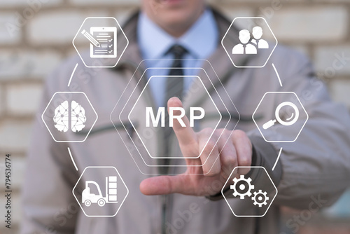 Man using virtual touch screen clicks text: MRP. MRP Material Requirement Planning Industry Business Process Automation concept. Stock inventory demand control. Explained resource scheduling network.