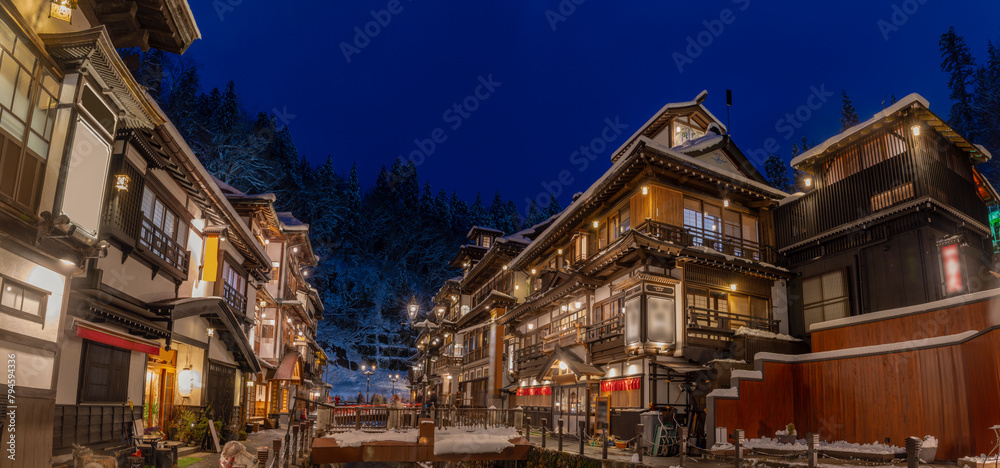 snowy winter evening in Ginzan Onsen, which is a famous hot spring town in Obanazawa, Yamagata, Japan