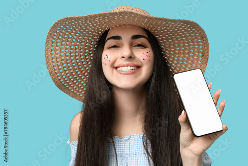 Smiling young woman in stra...