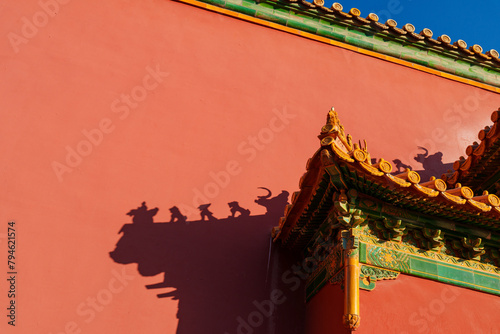 Red Wall and Glazed Tile Decoration of a Gate of a Palace in Jingshan Park photo