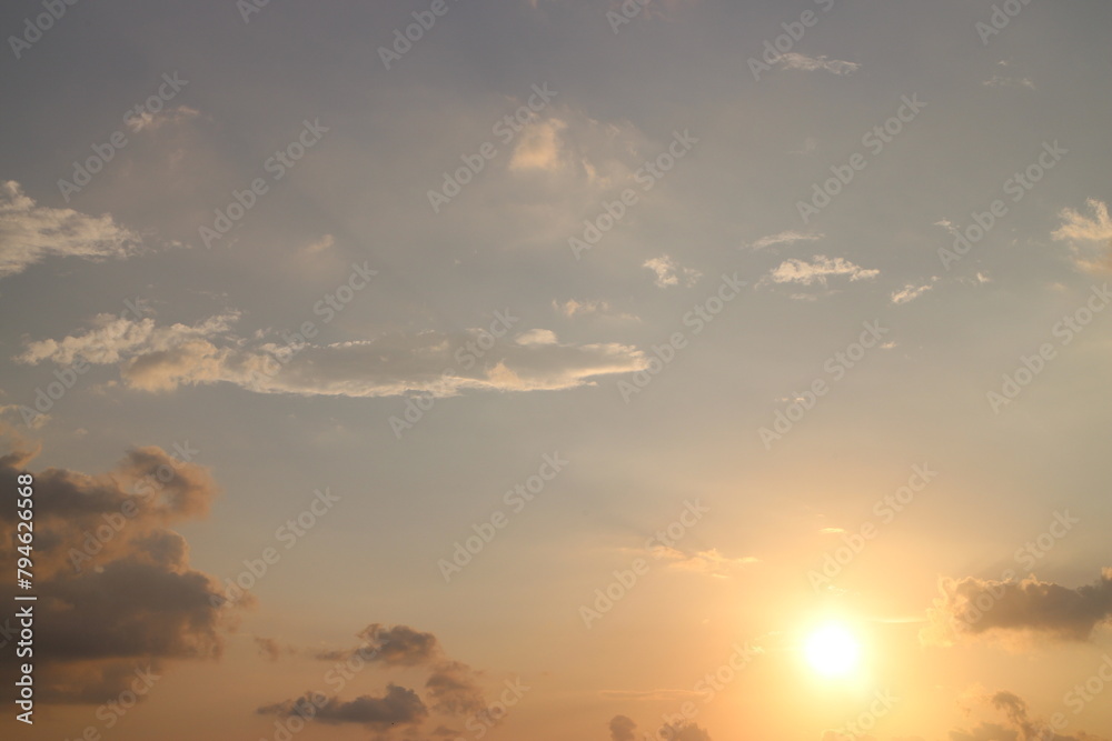 Sunset Sky, Beautiful nature in Early Morning with Orange, Yellow sunlight clouds fluffy, Golden Hour Sunrise summer Background