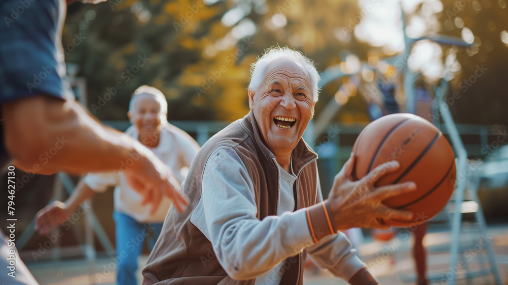 Fototapeta premium old man playing basketball