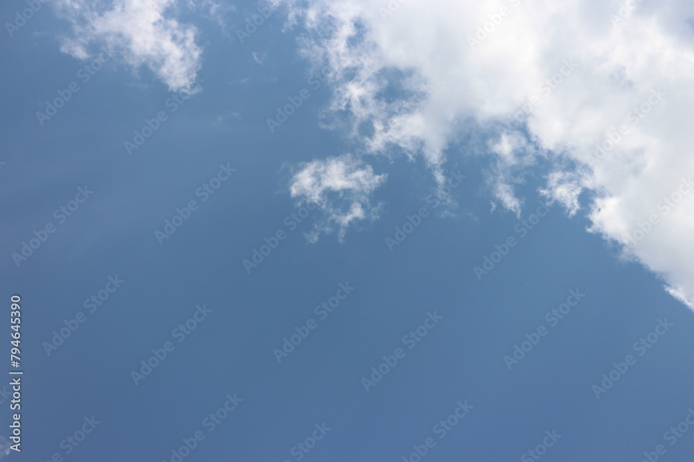 Obraz premium white cloud on blue sky background