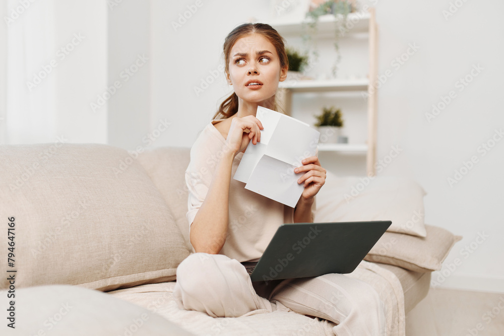 Smiling Woman Typing on Laptop in Cozy Home Office Smiling Woman Typing on Laptop in Cozy Home Office
