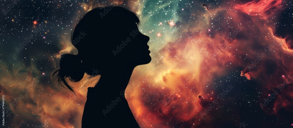 A female silhouette with a contemplative expression, looking upwards at the mesmerizing stars scattered across the dark sky