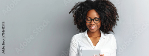 Black woman, tablet and happy in studio for good news, internet and social media. Fashion designer, technology and smile on isolated white background for online shopping, banner and trendy style