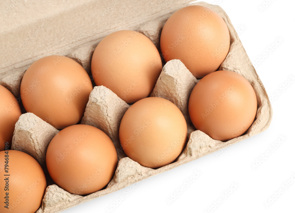 Chicken eggs in carton isolated on white, top view Chicken eggs in carton isolated on white, top view