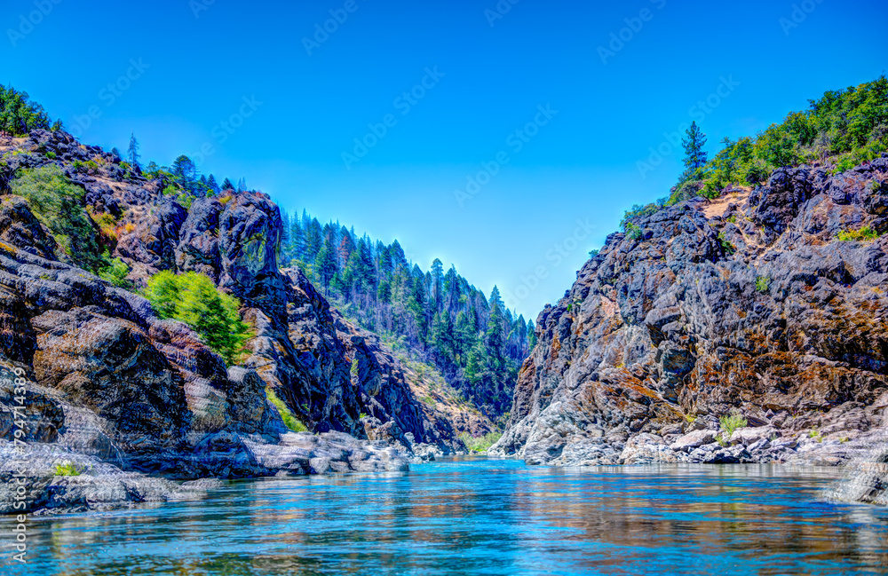 defocused Water level view of Hellgate Canyon on the wild and scenic Rogue River 