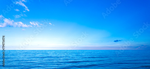 Ocean sea background and the clear sky For summer vacation ideas Nature of summer sea water with sunlight The sea sparkles against the blue sky 