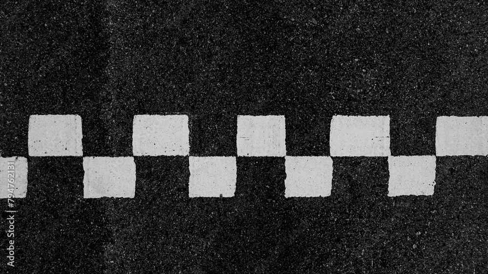Obraz premium Aerial view abstract asphalt black Start and Finish grid line for race car in circuit texture background, Automobile and automotive background.