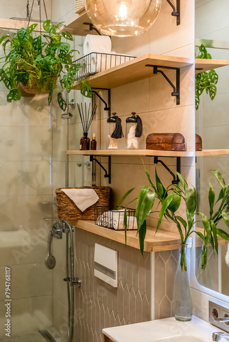 Minimal boho style of bathroom interior with wooden shelves