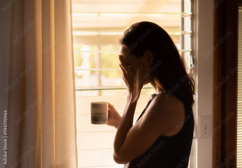 Woman at home feeling sad tired stressed and worried suffering depression mental health problems  - obrazy, fototapety, plakaty 
