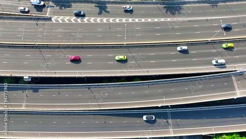 Canvastavla Aerial view, Swiftly soaring above the bustling expressway, the drone captures the dynamic flow of vehicles, epitomizing modern transportation efficiency