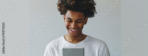 Black man, tablet and happy in studio for social media, internet and good news. Fashion designer, technology and smile on isolated white background for online shopping, clothes or trendy style banner