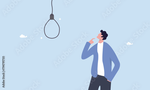 Doubtful businessman looking at lightbulb idea thinking it look like noose trap, business risk or challenge, mistake or failure, bad and stupid idea or self sabotage, business trap and pitfall concept photo